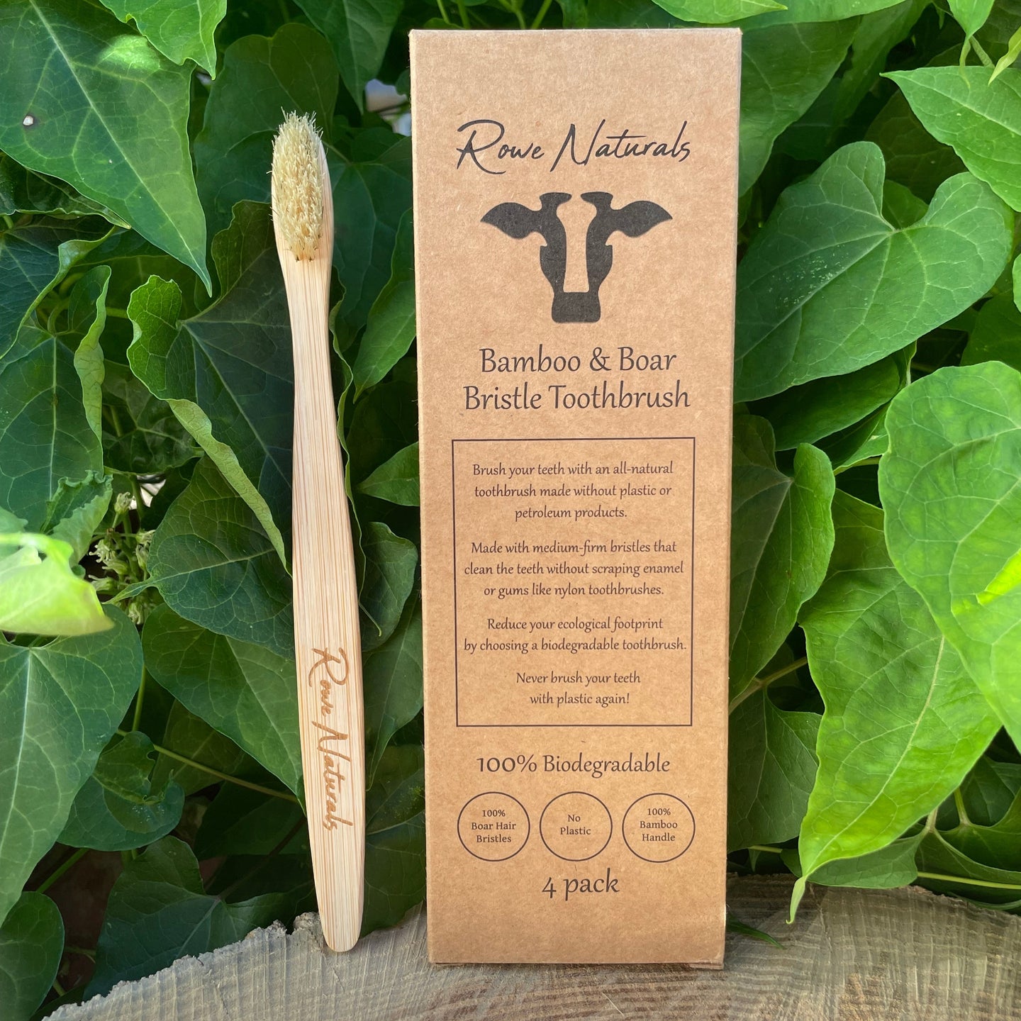 Showcase Rowe Naturals' eco-friendly bamboo and boar bristle toothbrush, highlighting its biodegradable packaging and commitment to plastic-free oral hygiene.