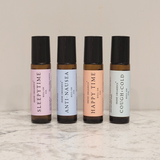 Irene Organics displays natural essential oil roll-ons for sleep, nausea, mood boost, and cold relief.
