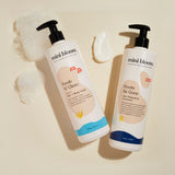 Mini Bloom hair products, including Fresh N' Clean hair and body wash and Knots Be Gone detangling treatment, sit beside foam and cream.

