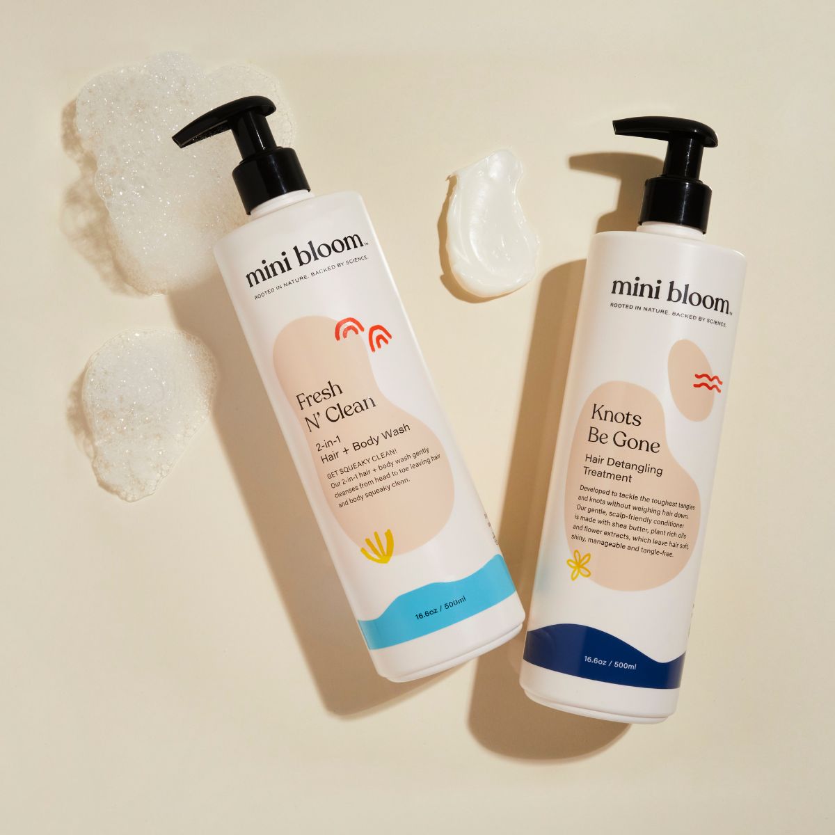 Mini Bloom hair products, including Fresh N' Clean hair and body wash and Knots Be Gone detangling treatment, sit beside foam and cream.
