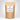 A kraft paper bag presents Rustic Strength powder laundry detergent, advertising unscented, hypoallergenic, and earth-derived minerals.
