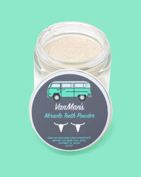 View shows VanMan's Miracle Tooth Powder in an open jar, featuring a retro van illustration.
