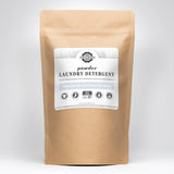 A bag of Rustic Strength laundry detergent powder promises unscented, hypoallergenic, and earth-derived cleaning power.
