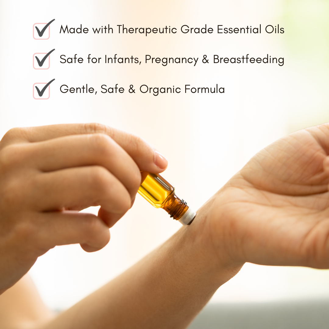 Person applies organic essential oil rollerball to their wrist, highlighting its safe and gentle formula for infants, pregnancy, and breastfeeding.

