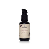 Annmarie Anti-Aging Facial Oil sits on a white surface, showcasing its restorative moisturizer qualities.
