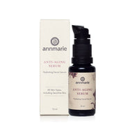 Annmarie Anti-Aging Serum with Hydrating Facial Serum stands beside its packaging.
