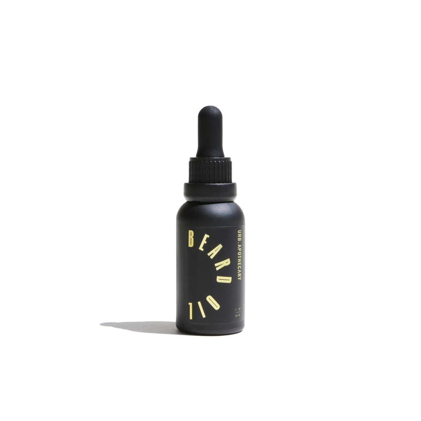 A sleek, black bottle showcases URB Apothecary beard oil with a dropper, promising grooming and care.
