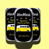 Three tins of VanMan's peppermint beeswax lip balm feature a yellow Volkswagen bus graphic and bee icons.
