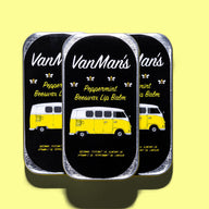Three tins of VanMan's peppermint beeswax lip balm feature a yellow Volkswagen bus graphic and bee icons.
