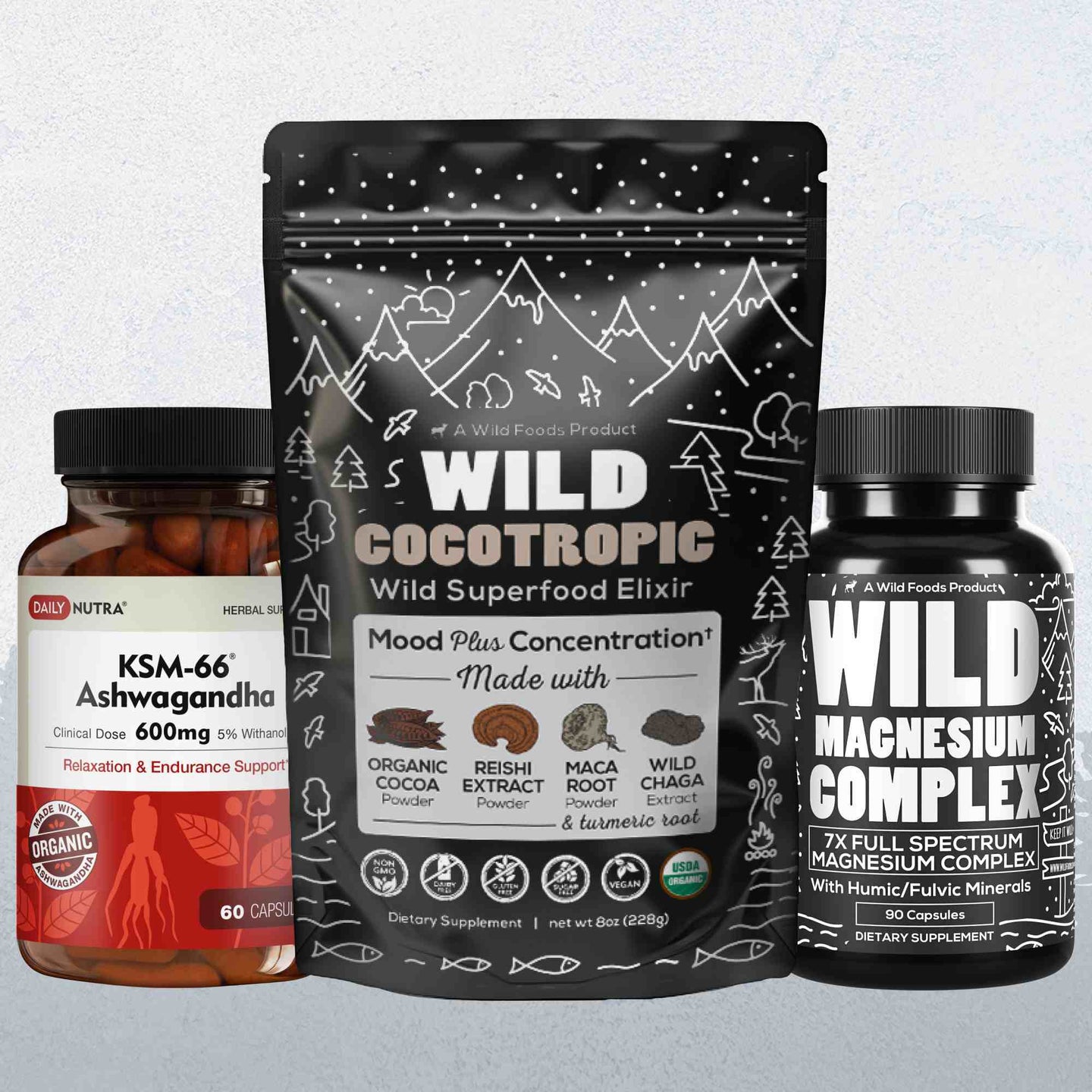 Shows a bottle of Ashwagandha capsules, a bag of Wild Cocotropic superfood elixir, and a bottle of Wild Magnesium Complex supplements for improved health and wellness.