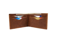 An open brown leather wallet displays its card slots filled with credit cards and a driver's license.
