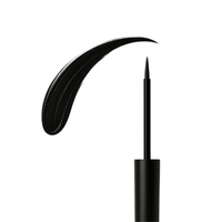 Black liquid eyeliner creates a thick, curving stroke of makeup.
