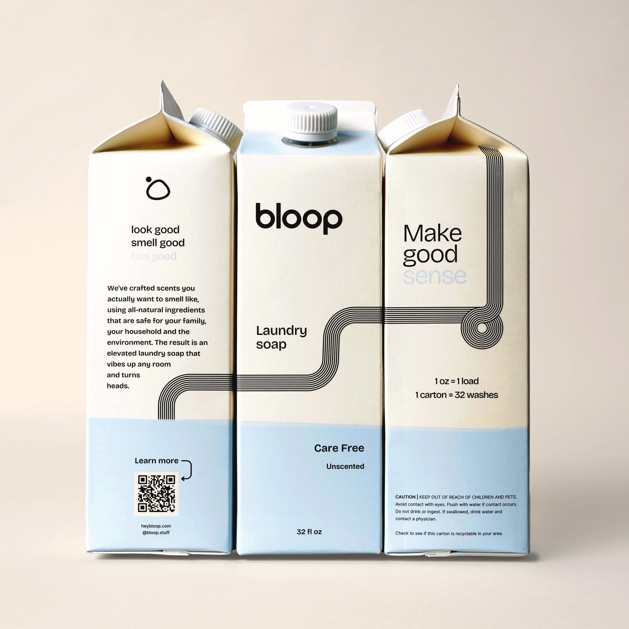 Three bloop laundry soap cartons feature modern design, touting natural ingredients and inviting scents.
