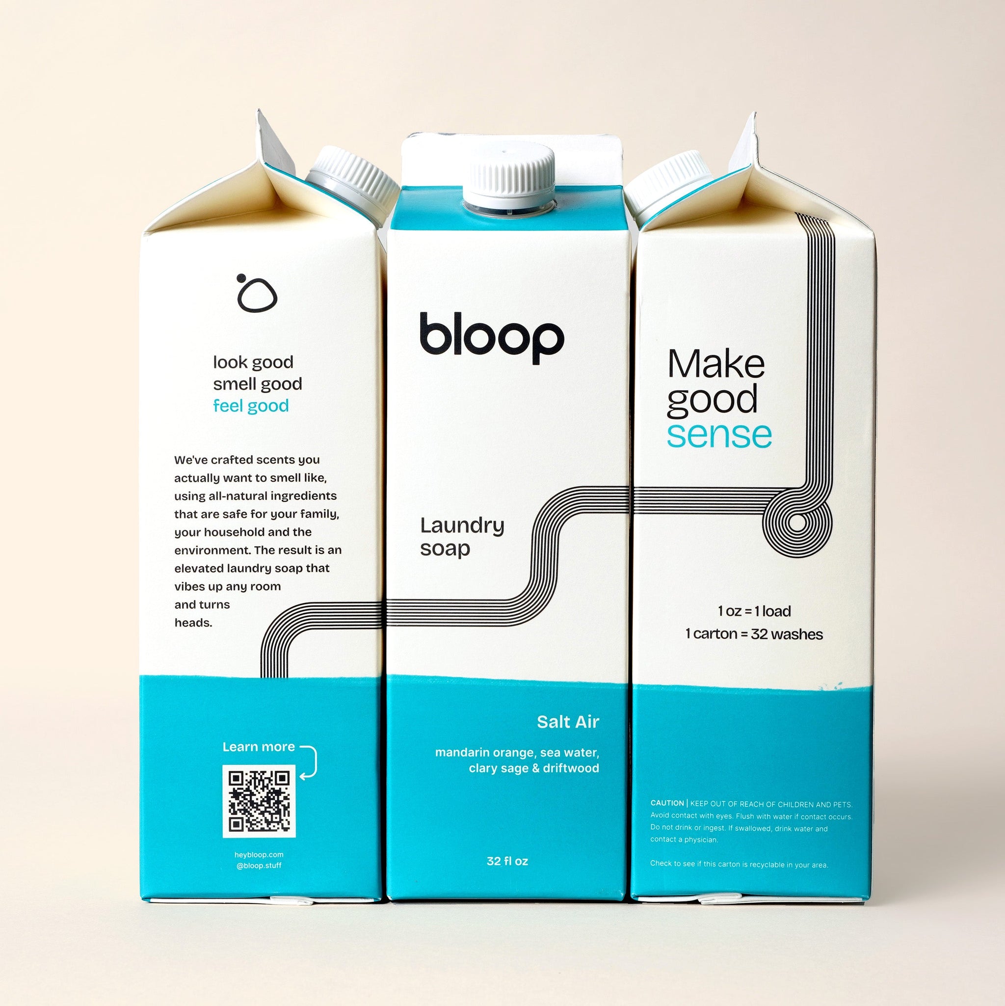 Bloop Laundry Soap cartons advertise their eco-friendly laundry detergent with all-natural ingredients and the Salt Air scent.
