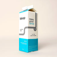 Bloop laundry soap in a recyclable carton promises 32 washes with a "Salt Air" scent.
