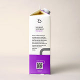 A carton of Bloop laundry soap highlights its all-natural, family-safe ingredients with a QR code for more information.
