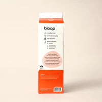 Bloop's eco-friendly laundry detergent carton showcases its cruelty-free, toxin-free, and earth-conscious formula.

