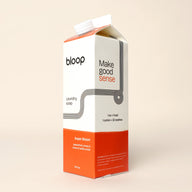 A Bloop Super Bloom laundry soap carton promises a clean with notes of passionfruit, peony, and vanilla orchid.
