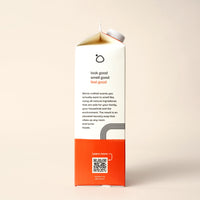 A laundry soap carton promotes its all-natural ingredients, appealing scents, and eco-friendly formula for family and household use.
