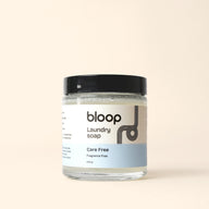 Bloop laundry soap, a fragrance-free and care-free 4 oz detergent, sits on a neutral background.

