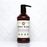 Showcasing Rustic Strength body wash with lavender and tea tree essential oils for soft, refreshed skin.
