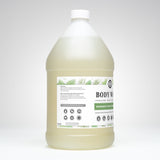 Rustic Strength displays its rosemary and mint essential oil body wash, highlighting its non-toxic, coconut-based, and sensitive skin friendly formula.