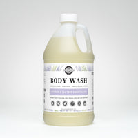 Rustic Strength body wash bottle features lavender and tea tree essential oils for a luxurious, non-toxic, and sensitive skin-approved cleansing experience.
