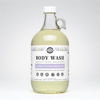 Rustic Strength's gallon jug of lavender and tea tree essential oil body wash promises luxurious, non-toxic cleansing for sensitive skin.