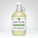 Rustic Strength sells their rosemary mint essential oils body wash in a clear gallon jug.