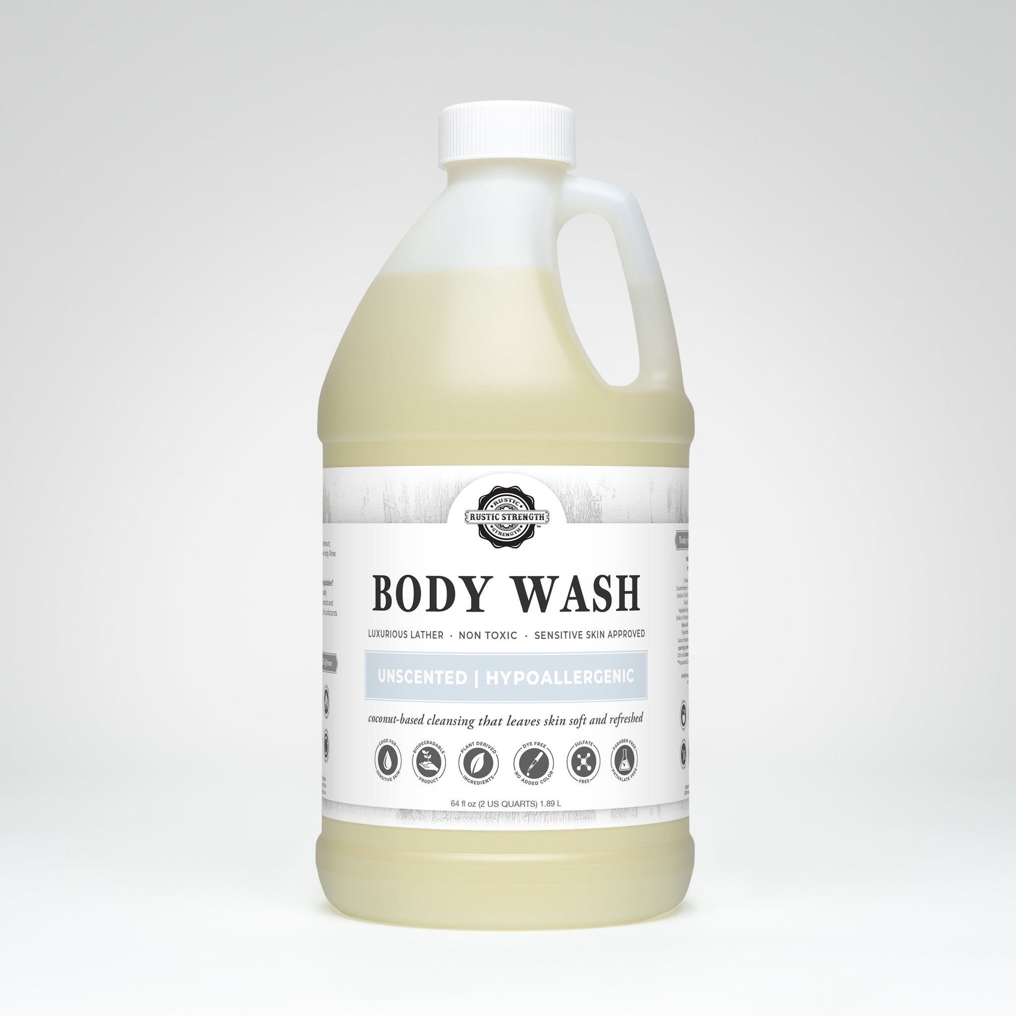 A large bottle of Rustic Strength Body Wash advertises its unscented, hypoallergenic, and coconut-based formula for sensitive skin.