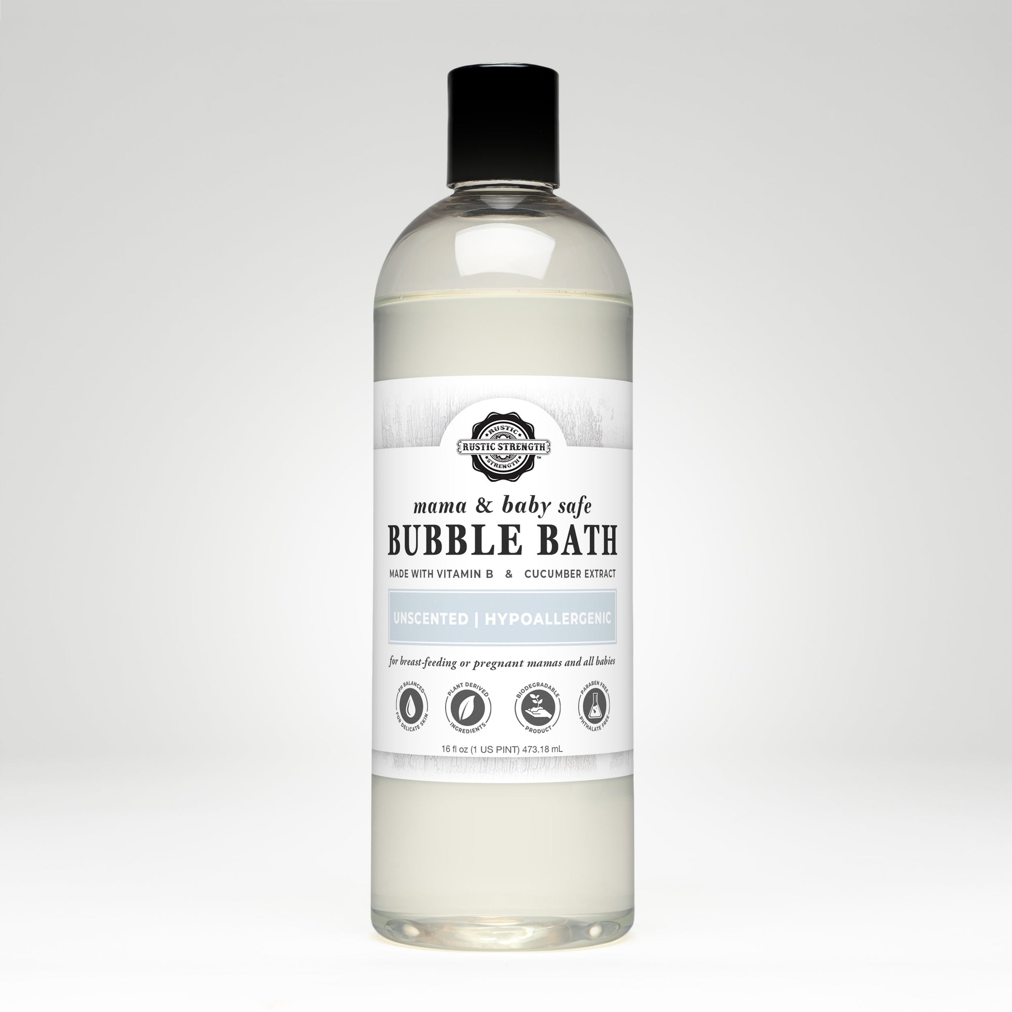 Bottle displays unscented, hypoallergenic Rustic Strength bubble bath safe for mama and baby, made with vitamin B and cucumber extract.
