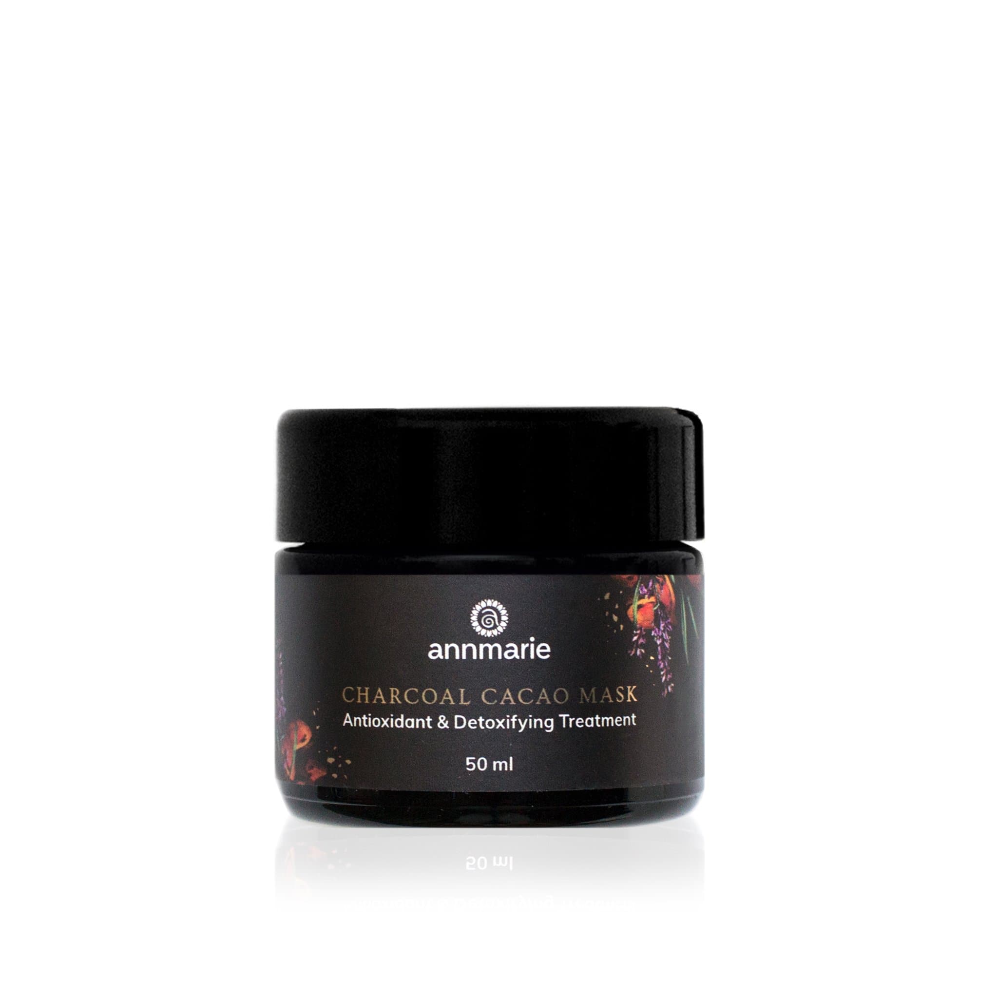 Annmarie's Charcoal Cacao Mask, an antioxidant and detoxifying treatment, presents in a 50ml jar against a stark white background.
