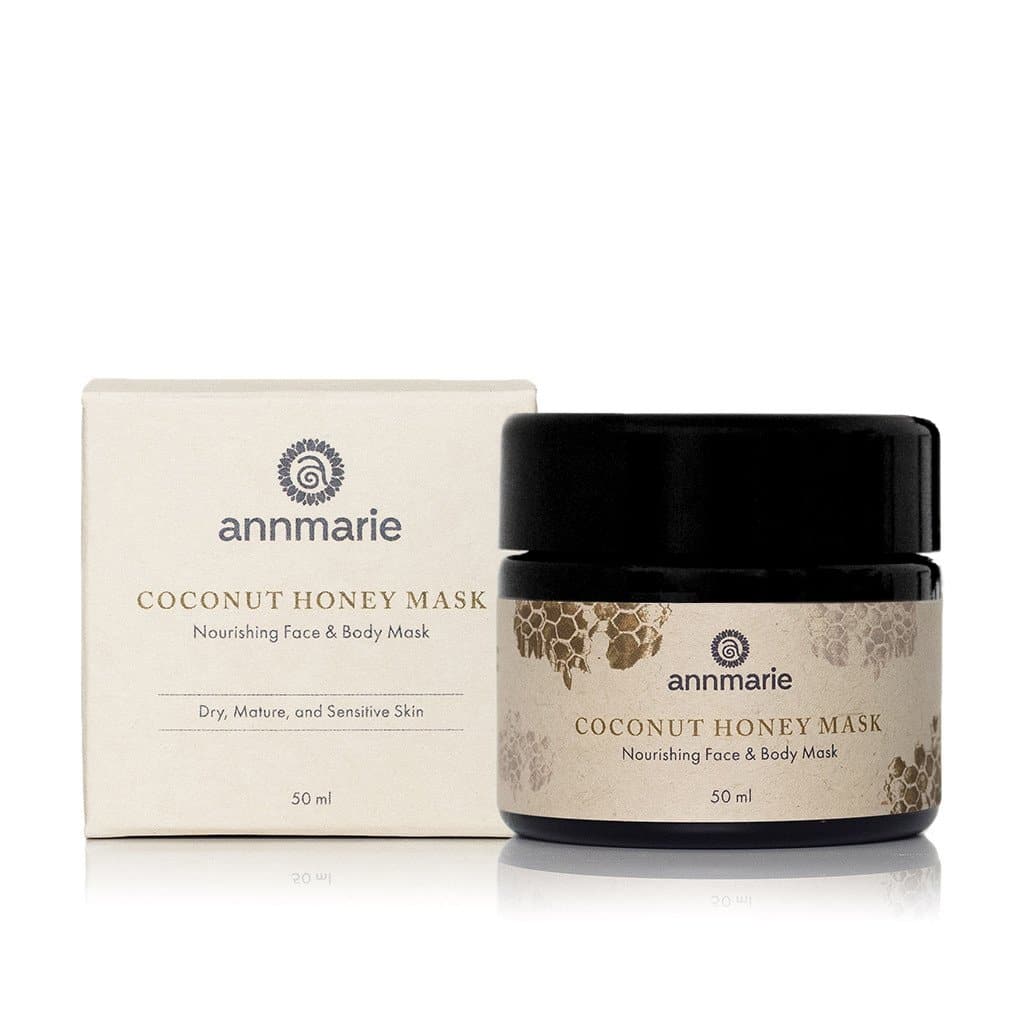 Annmarie Coconut Honey Mask for nourishing face and body sits next to its product box.
