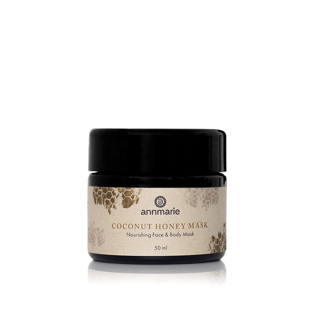 Annmarie Coconut Honey Mask nourishes face and body, showcased in a 50ml jar with honeycomb design.

