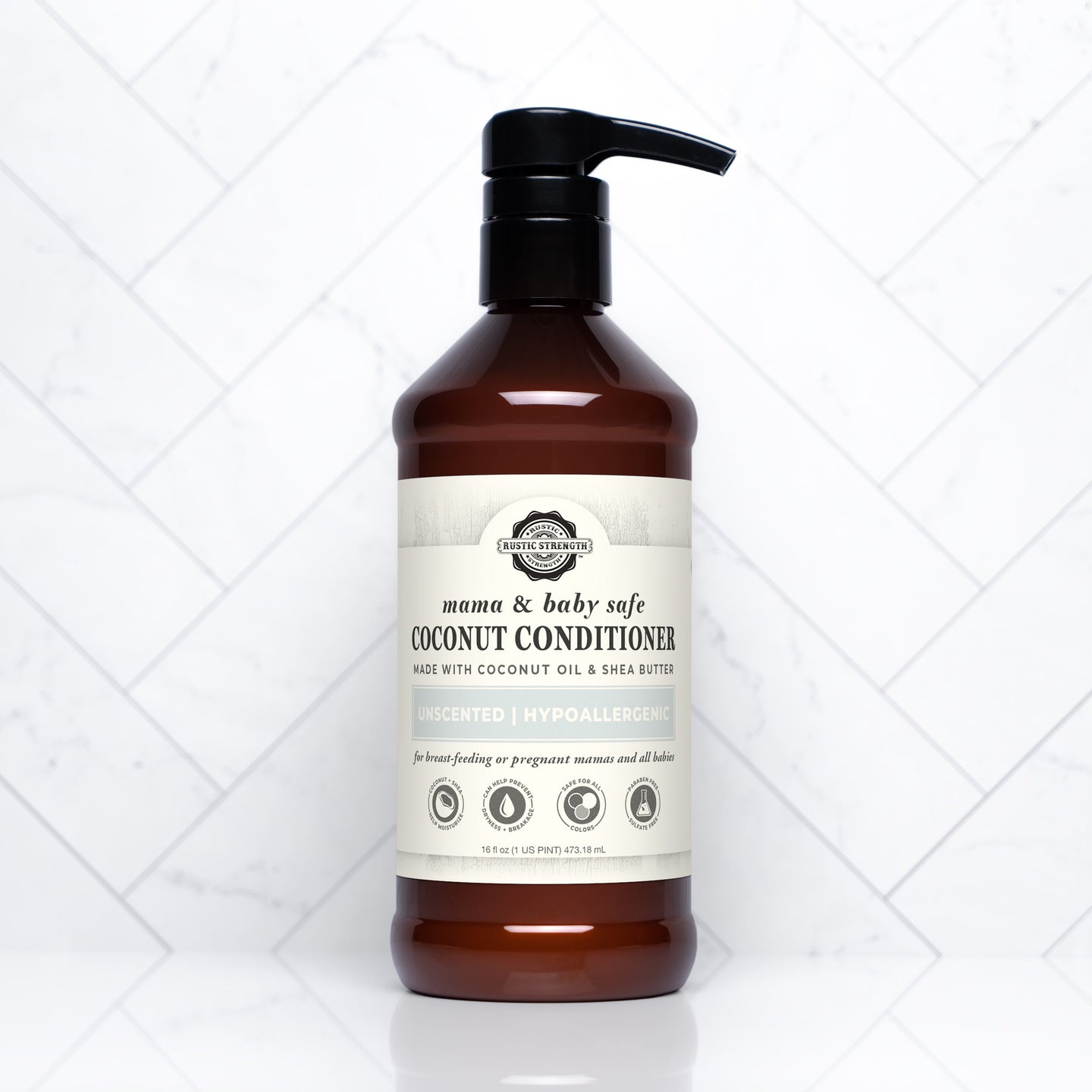 Rustic Strength sells their mama and baby safe, hypoallergenic coconut conditioner made with coconut oil and shea butter in a brown bottle with a pump.