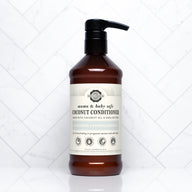 Rustic Strength sells their mama and baby safe, hypoallergenic coconut conditioner made with coconut oil and shea butter in a brown bottle with a pump.
