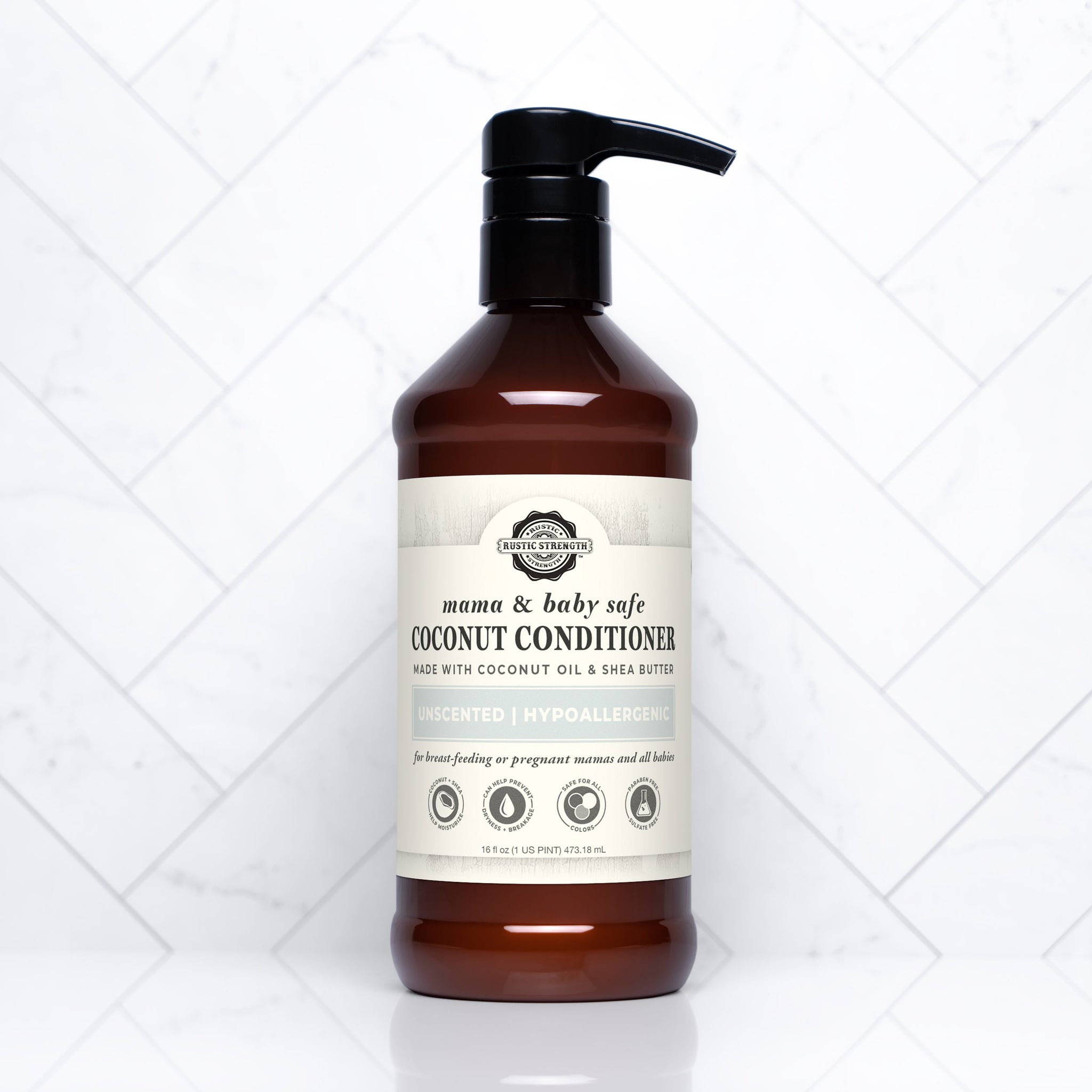 Rustic Strength sells their mama and baby safe, hypoallergenic coconut conditioner made with coconut oil and shea butter in a brown bottle with a pump.