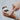 Woman rubbing lotion onto hand