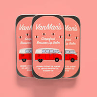 Three tins of VanMan's Grapefruit Beeswax Lip Balm feature a retro VW bus design.
