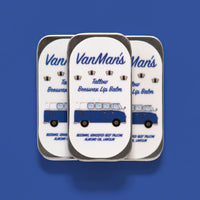 Showcases three tins of VanMan's Tallow Beeswax Lip Balm featuring a vintage blue van design.

