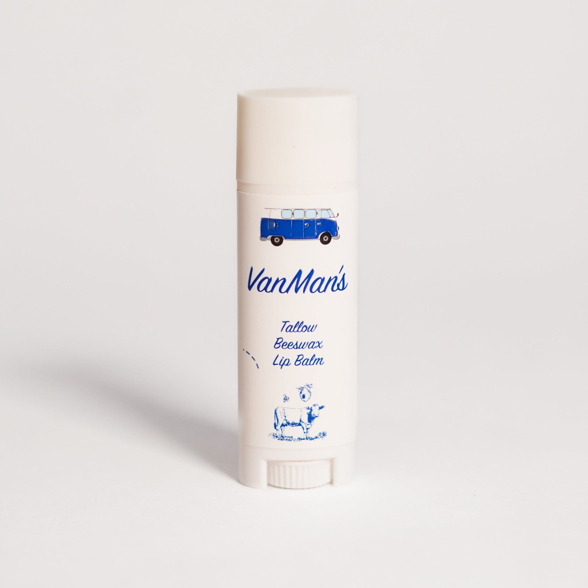 Van Man's tallow beeswax lip balm features a blue vintage van and cow illustration.
