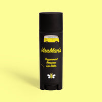 VanMan's Peppermint Beeswax Lip Balm features a yellow VW bus and a cute bee on its black tube.
