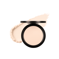 Makeup powder compact sits next to a swatch of pressed powder foundation.
