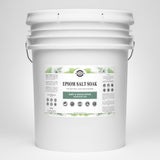 Discover a large bucket of Rustic Strength Epsom Salt Soak, featuring Mint & Eucalyptus essential oils for natural skin moisturizing.