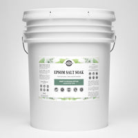 Discover a large bucket of Rustic Strength Epsom Salt Soak, featuring Mint & Eucalyptus essential oils for natural skin moisturizing.