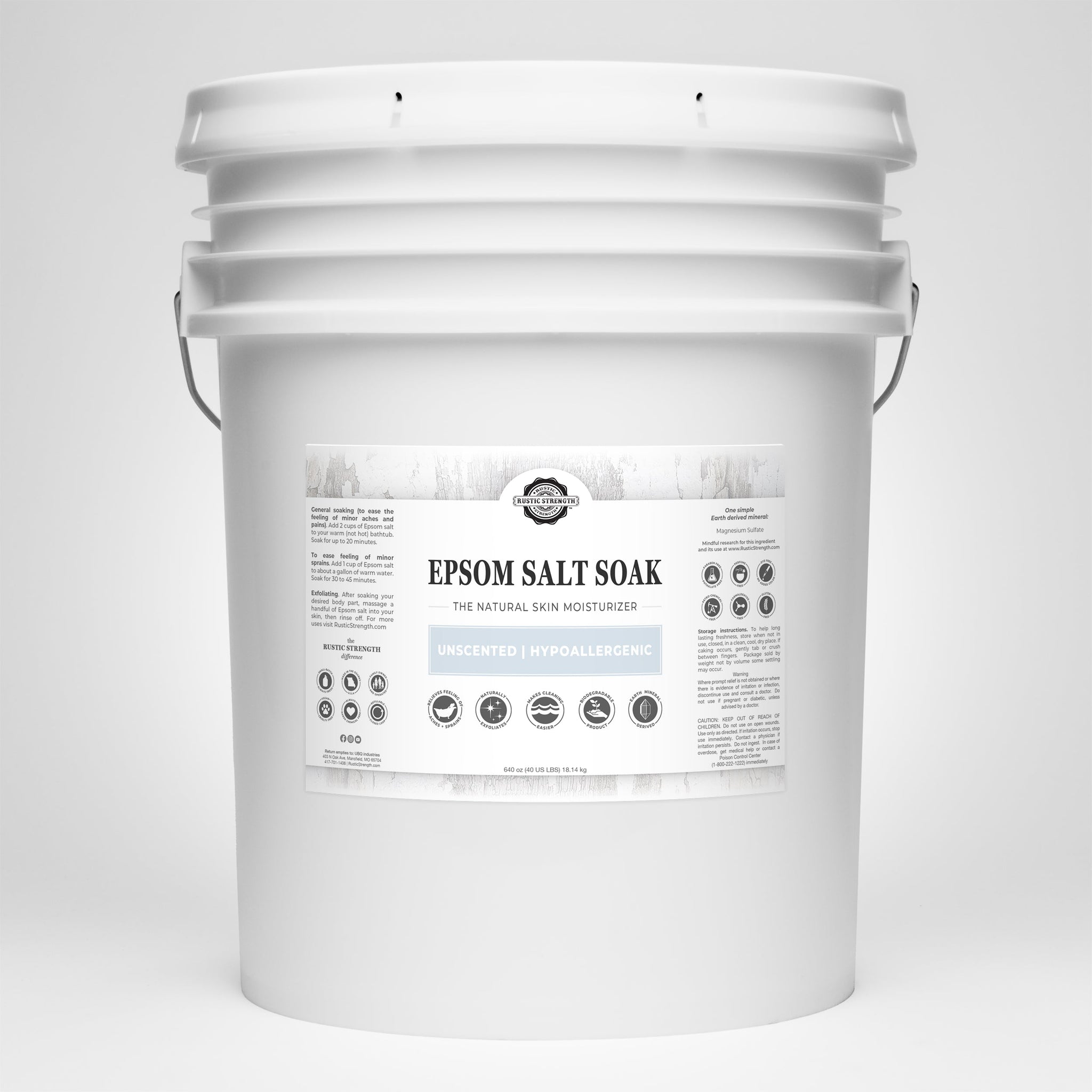 View a large white bucket containing Rustic Strength Epsom Salt Soak, an unscented and hypoallergenic natural skin moisturizer.
