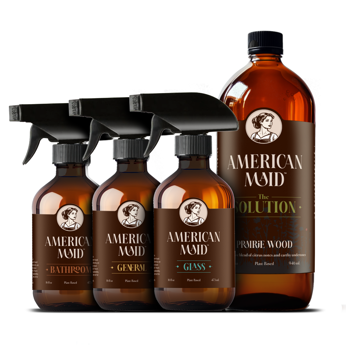 American Maid plant-based cleaning products, including bathroom cleaner, general cleaner, glass cleaner, and prairie wood scented solution, display elegantly against a black background.
