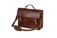 Showcases a stylish brown leather satchel briefcase with buckled pockets and a shoulder strap.
