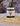Showcases Rowe Naturals extra strength tallow balm jar surrounded by dried calendula petals, promoting organic skincare.
