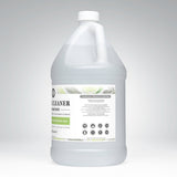 A gallon jug showcases plant-based cleaner concentrate with cypress essential oils, highlighting its toxin-free ingredients for surfaces and sealed floors.